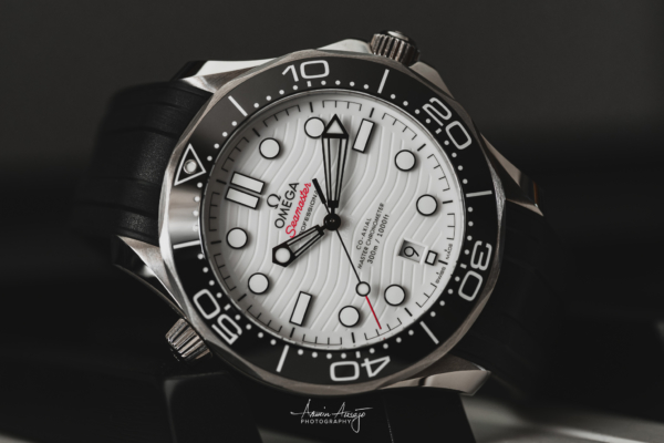 Omega Seamaster Diver 300M on top of piano keys