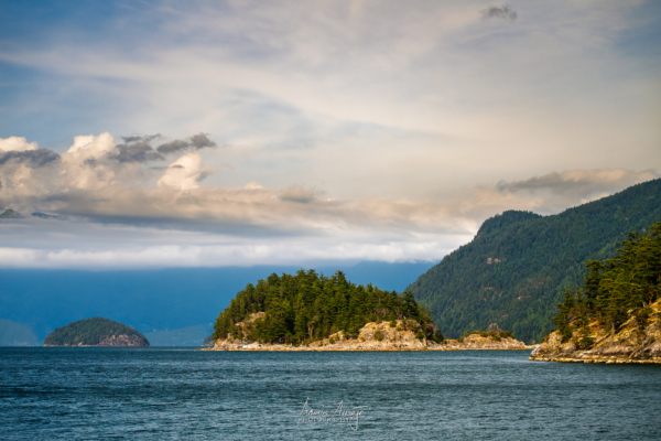Islands, mountains, and clouds in the Strait of Georgia